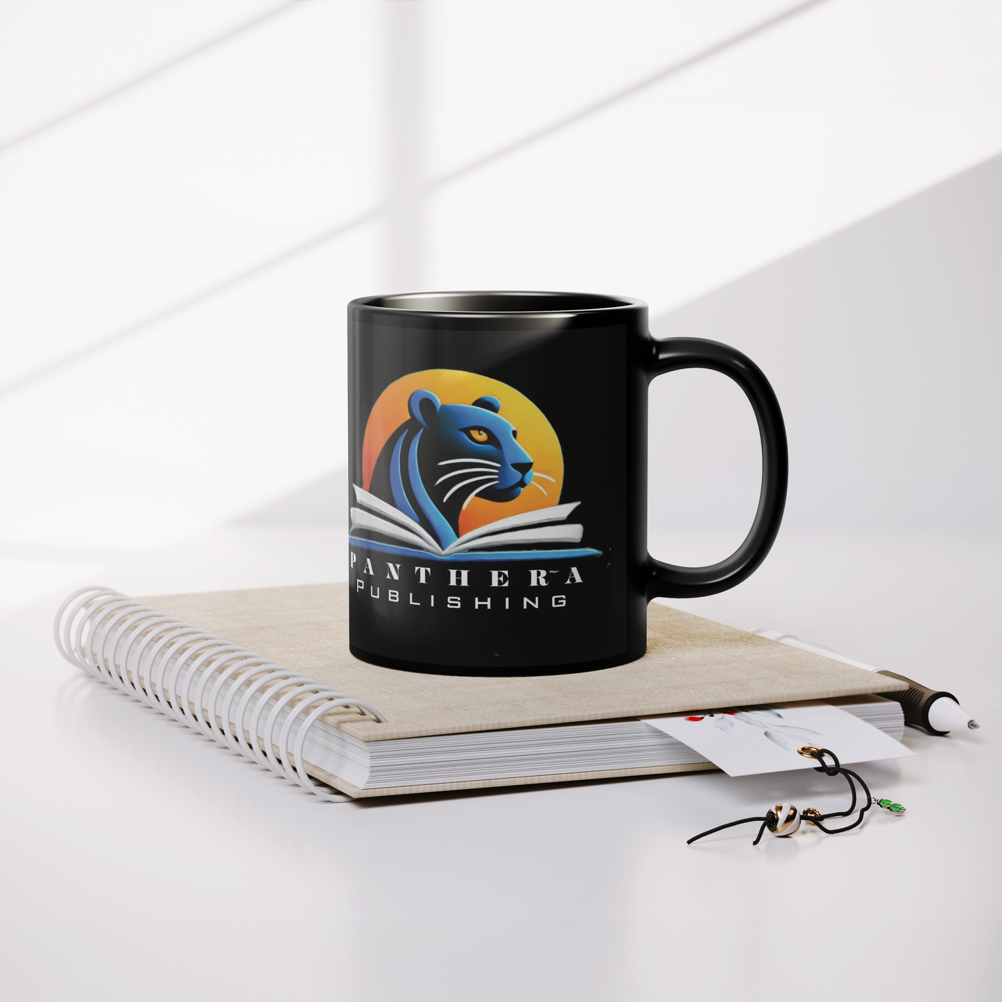 Panthera_Mug_Black_Lifestyle_Notebook_Mockup.png